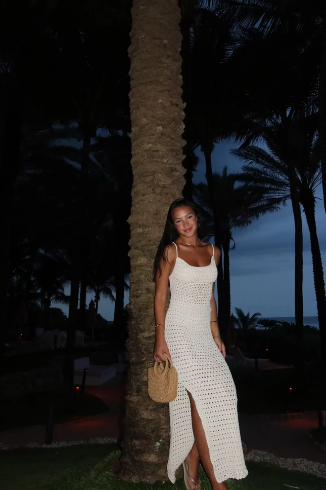 Knitted cut out model tassel design jurk